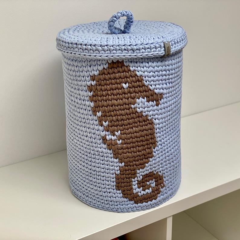 Storage basket with a seahorse pattern for nursery décor and storing toys